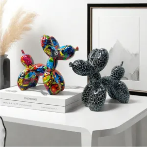 Detailed view of creative resin balloon dog ornaments, graffiti and cracked styles for home.
