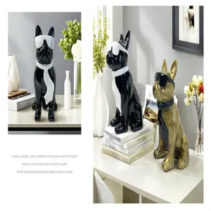 Resin French bulldog ornament with sunglasses and ribbon scarf, stylish home desk decor piece.