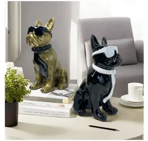 Resin French bulldog ornament with sunglasses and ribbon scarf, stylish desktop home decor detail view.