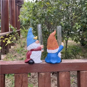 Resin gnome rain gauge detail shot, garden decorative rain measuring tube outdoor ornament.