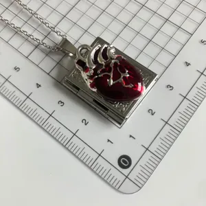 Silver tone anatomical heart book locket pendant necklace gothic jewelry accessory item new