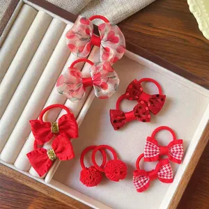 Dettagli di elastici per capelli rossi per bambini con fiocchi, alta elasticità e stile.
