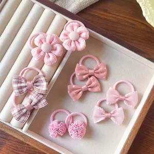 Set di elastici per capelli per bambini con simpatici fiocchi, perfetti per uso quotidiano.