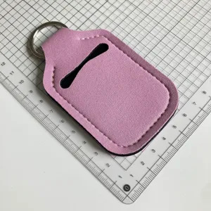 Llavero de neopreno rosa para botella, funda portátil para perfume, lápiz de labios y gel.