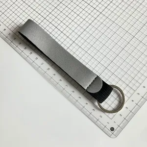 Grey wrist lanyard keychain with metal ring, portable strap for keys and daily use.