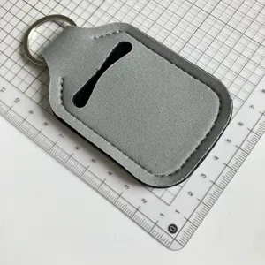 Funda llavero de neopreno portátil para botella de perfume o gel, color gris.