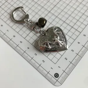 Portachiavi gotico argento cuore pipistrello medaglione punk metallo borsa ciondolo