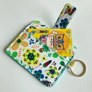 Floral pattern card holder wallet with keychain and snap button for women daily use and travel.