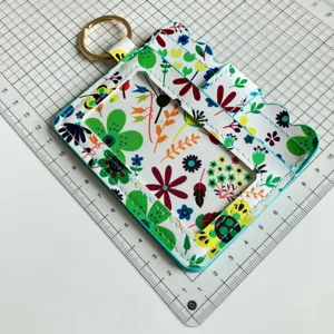 Floral print card holder detail view, PU leather ID badge case with keychain and transparent window.