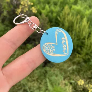 Blue wooden heart keychain with mama engraving and metal ring for bags and car keys daily use