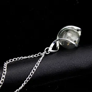 Silver-plated dandelion glass ball pendant necklace, vintage botanical wishing jewelry piece.