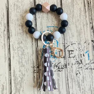 Silikon Perlen Armband Schlüsselanhänger mit PU Leder Quaste Schwarz Weiß Perlen Ring