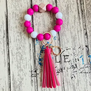 Bunter Silikonperlen Armband Schlüsselanhänger mit Holzperlen und eleganter PU Leder Quaste.