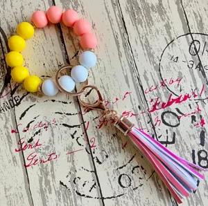 Bunter Silikonperlen Schlüsselanhänger Armband mit PU Leder Quaste für den Alltag