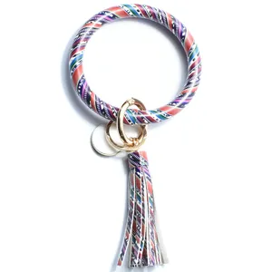 Porte-clés jonc rond en cuir PU à imprimé géométrique coloré avec détail de pompon