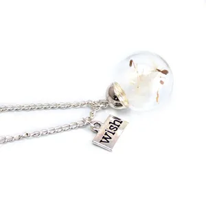 Dandelion glass ball necklace detail, wishing charm sweater chain close up view.