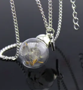 Exquisite glass globe dandelion seed necklace with silver chain and letter charm.