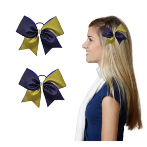 Glitter color-blocked hair bow with rhinestones, showing product details and model wear.