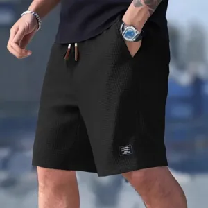 Shorts décontractés gaufrés pour hommes été coupe ample streetwear bermuda mode.