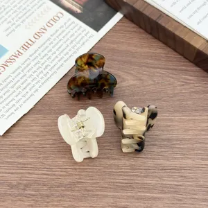 Mini acetic acid hair claw clips featuring stylish patterns, perfect for chic daily hairstyles.