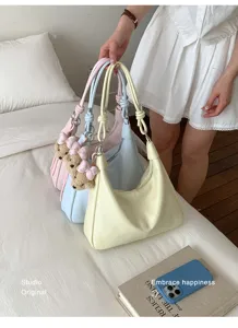 Retro casual shoulder tote bag with cute bear charm, soft PU leather commuter hobo bag for daily wear.