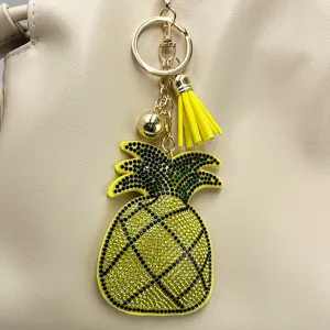 Strass Ananas Schlüsselanhänger Detailaufnahme mit glitzernden Kristallen und gelber Quaste.