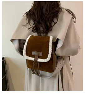 Stylish retro brown suede backpack with soft white sherpa trim for women autumn daily use.
