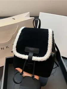 Black and white plush backpack for women, stylish fleece trim school bag with drawstring.