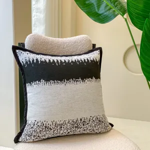 Minimalist black and white striped throw pillow for cozy living room sofa decoration and comfort.