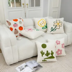 Textured tufted plush pillow cover with embroidery floral design for cozy sofa home decor.