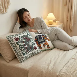 Housse de coussin éléphant brodé de style asiatique pour déco de canapé de chambre.