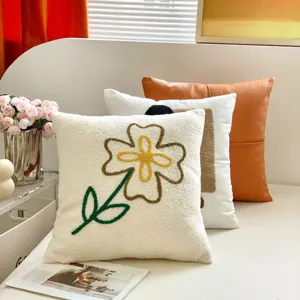 Cream style embroidered decorative pillow detail, modern minimalist cushion for sofa and bed.