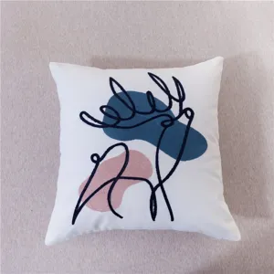 Close-up detail of modern abstract line art throw pillow with geometric color block embroidery.