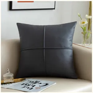 Nordic minimalist dark grey PU leather sofa throw pillow detail view, waterproof cushion.