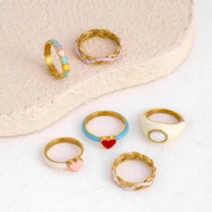 Set of 6 colorful enamel heart and braided stainless steel rings for women, fashion style.