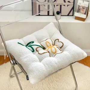 Thickened plush seat cushion with cute tufted flower embroidery for cozy home and office chair.