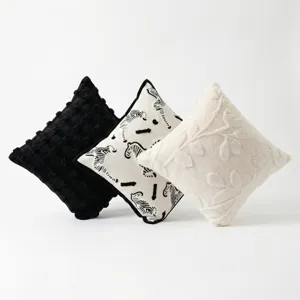 Modern throw pillow covers, textured black, zebra and plush cushion cases for sofa decor.