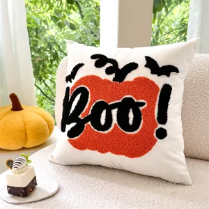 Halloween pumpkin throw pillow with tufted embroidery BOO text for cozy home decor