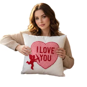 Valentine's Day tufted embroidered pillow cover with cute heart and love lettering.