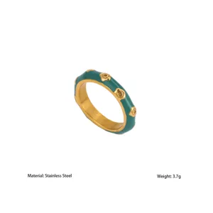 Detail shot of the vintage green enamel stainless steel ring with gold floral studs. 3.7g.