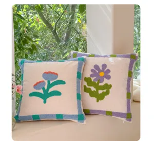 Cute vintage tufted throw pillow with floral tulip pattern for cozy sofa and living room decor