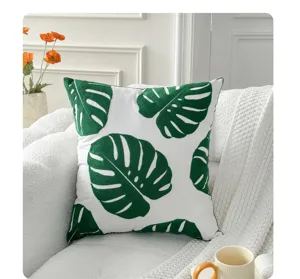 Nordic green monstera leaf embroidered throw pillow cushion detail view for cozy living room.