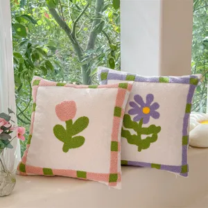Tufted throw pillow with cute tulip and flower design, plush cushion for sofa decor.