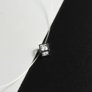 Exquisite invisible fishing line necklace with a cubic zirconia geometric pendant for women.
