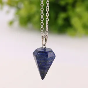 Close-up of a blue lapis lazuli hexagonal prism pendulum pendant necklace detail.