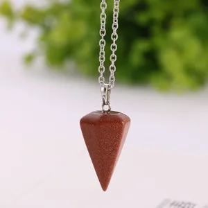 Close-up of goldstone conical crystal pendulum pendant necklace exquisite detail view.