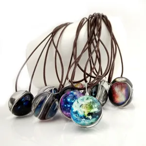 Galaxy glass pendant necklace set featuring miniature universe planet designs with brown cords.