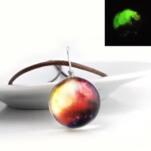 Luminous glass galaxy globe pendant necklace with brown cord for women and girls daily wear.