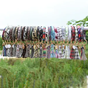 PU leather wristlet keychain bracelet with tassel, multi-pattern bangle key ring for women.