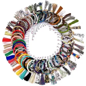 Portachiavi bracciale con nappa in pelle PU alla moda con vari motivi colorati eleganti